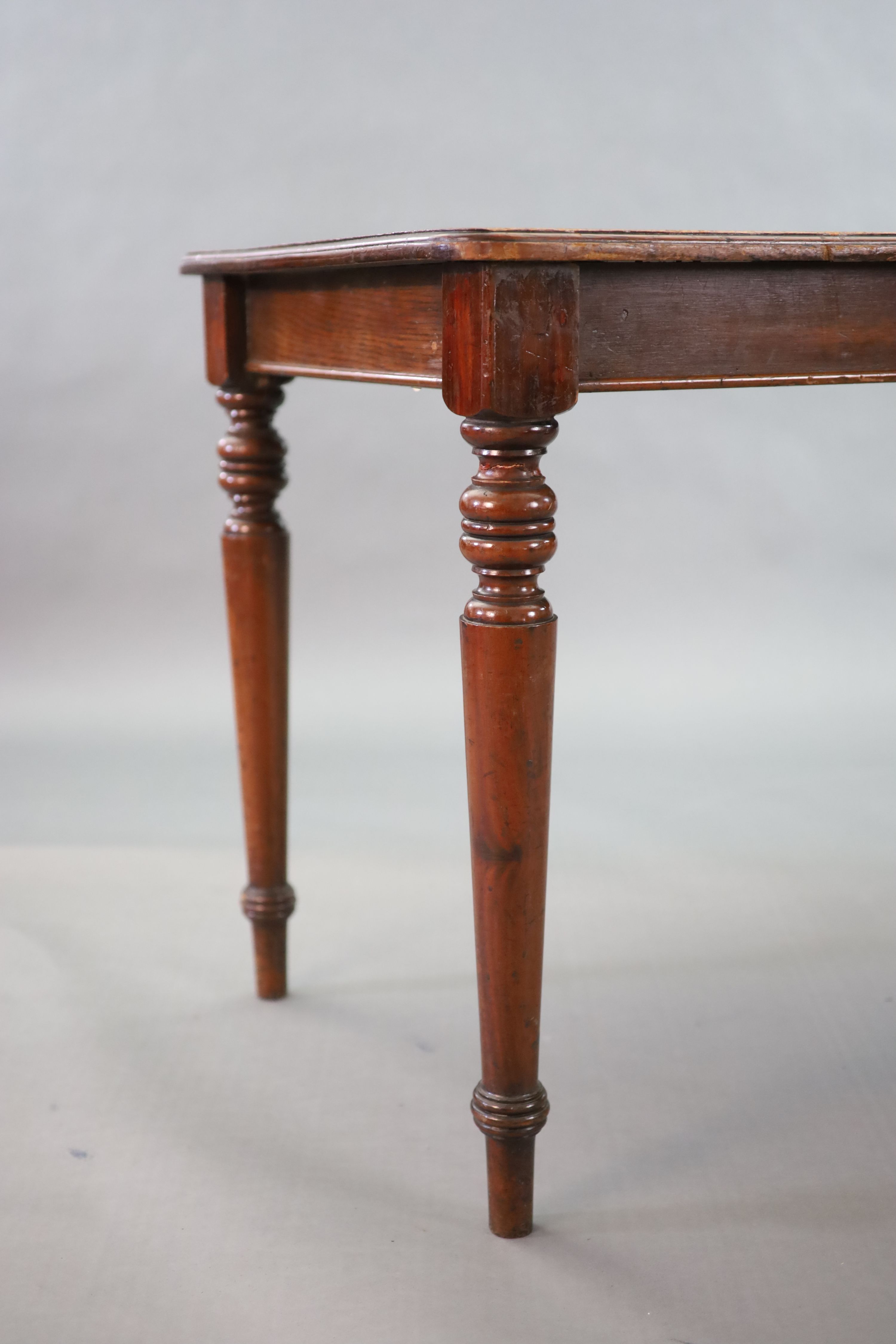 A pair of late Victorian mahogany writing tables, W.112cm D.68cm H.77.5cm